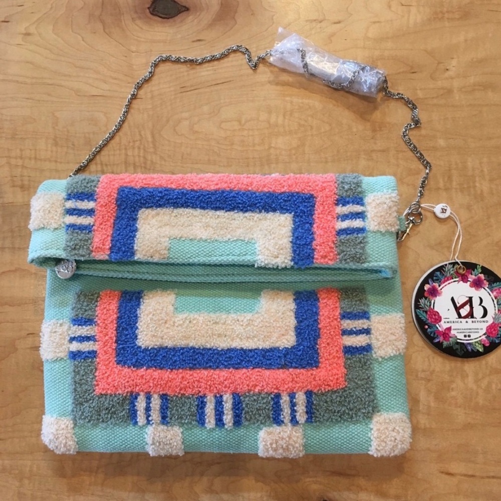 America and Beyond clutch snap closure embroidered